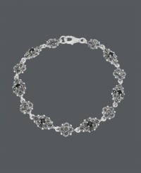 Flaunt good looks in fabulous filigree. Genevieve & Grace bracelet features an intricate link chain that highlights onyx center stones (3 mm) and glittering marcasite. Crafted in sterling silver. Approximate length: 7-1/2 inches. Flaunt good looks in fabulous filigree. Genevieve & Grace bracelet features an intricate link chain that highlights onyx center stones (3 mm) and glittering marcasite. Crafted in sterling silver. Approximate length: 7-1/2 inches.