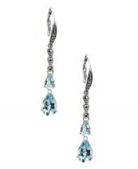 Take your special occasion style to a whole new level. Judith Jack's stunning drop earrings feature two pear-cut blue topaz (3-5/8 ct. t.w.) and glittering marcasite (1/5 ct. t.w.). Set in sterling silver. Approximate drop: 1-3/4 inches. Take your special occasion style to a whole new level. Judith Jack's stunning drop earrings feature two pear-cut blue topaz (3-5/8 ct. t.w.) and glittering marcasite (1/5 ct. t.w.). Set in sterling silver. Approximate drop: 1-3/4 inches.