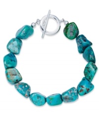 Add a touch of turquoise. Avalonia Road's pretty toggle bracelet features asymmetrical nuggets of turquoise (21 ct. t.w.) in sterling silver. Approximate length: 7-1/2 inches. Add a touch of turquoise. Avalonia Road's pretty toggle bracelet features asymmetrical nuggets of turquoise (21 ct. t.w.) in sterling silver. Approximate length: 7-1/2 inches.