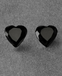 Love with a little drama. These crystal heart earrings by Betsey Johnson are set in goldtone mixed metal. Approximate width: 2/5 inch.