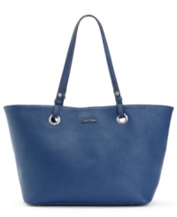 Going places? Be sure to bring along this Calvin Klein carryall that will take you from deskside to poolside in a wink. Soft Saffiano leather is discretely adorned with silver-tone accents, while the generous interior fits much more than just the day-to-day essentials. Going places? Be sure to bring along this Calvin Klein carryall that will take you from deskside to poolside in a wink. Soft Saffiano leather is discretely adorned with silver-tone accents, while the generous interior fits much more than just the day-to-day essentials.