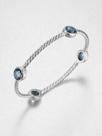 From the Renaissance Collection. Let this beautiful piece take you back in time with faceted London blue topaz stations on an iconic sterling silver cable design. London blue topazSterling silverDiameter, about 2.25Slip-on styleImported From the Renaissance Collection. Let this beautiful piece take you back in time with faceted London blue topaz stations on an iconic sterling silver cable design. London blue topazSterling silverDiameter, about 2.25Slip-on styleImported