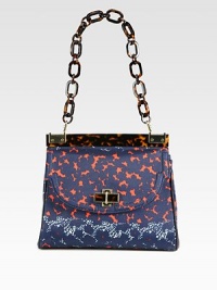 A charming floral print canvas style accented with glossy resin and radiant hardware.Chain shoulder strap, 8 dropMagnetic snap flap closureOne zip and two open inner compartmentsOne inside zip pocketTwo inside open pocketsCotton lining11W X 9½H X 3DImported A charming floral print canvas style accented with glossy resin and radiant hardware.Chain shoulder strap, 8 dropMagnetic snap flap closureOne zip and two open inner compartmentsOne inside zip pocketTwo inside open pocketsCotton lining11W X 9½H X 3DImported
