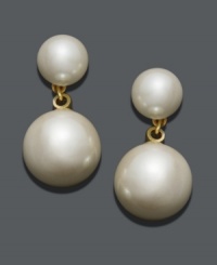 Complement an elegant updo with stylish drops. Charter Club earrings feature two graduated simulated plastic pearls crafted in mixed metal. Approximate drop: 1/2 inch. Complement an elegant updo with stylish drops. Charter Club earrings feature two graduated simulated plastic pearls crafted in mixed metal. Approximate drop: 1/2 inch.