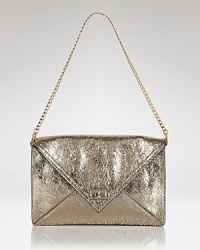 The power clutch is the accessory to want now, and this style from Milly tackles the trend in leather with a chic silhouette that's just right day-to-night. The power clutch is the accessory to want now, and this style from Milly tackles the trend in leather with a chic silhouette that's just right day-to-night.
