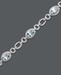 Inspired by crystal clear ocean waves. Luminous oval-cut aquamarine (5 ct. t.w.) shines as brightly as the diamond-accented oval links of this bracelet crafted from sterling silver. Approximate length: 7 inches. Inspired by crystal clear ocean waves. Luminous oval-cut aquamarine (5 ct. t.w.) shines as brightly as the diamond-accented oval links of this bracelet crafted from sterling silver. Approximate length: 7 inches.