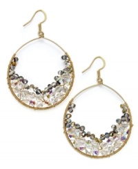 Bundles of eye-popping excellence. These hoop earrings from c.A.K.e by Ali Khan are dressed up with clusters of faceted glass beads. Crafted in coiled gold tone mixed metal. Approximate width: 1-3/5 inches. Bundles of eye-popping excellence. These hoop earrings from c.A.K.e by Ali Khan are dressed up with clusters of faceted glass beads. Crafted in coiled gold tone mixed metal. Approximate width: 1-3/5 inches.