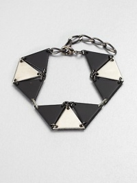 From the Facet Collection. Inspired by the mathematical genius of graphic artist M.C. Escher, this simple, strong linked triangle bracelet makes a striking statement.Powder-coated and antiqued brass and pewterLength, about 6-8 (adjustable)Lobster claspMade in USA From the Facet Collection. Inspired by the mathematical genius of graphic artist M.C. Escher, this simple, strong linked triangle bracelet makes a striking statement.Powder-coated and antiqued brass and pewterLength, about 6-8 (adjustable)Lobster claspMade in USA