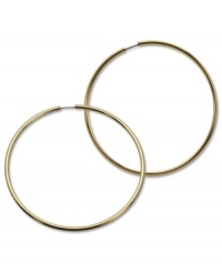 Infinite style with endless hoops. These GUESS earrings are crafted in gold tone mixed metal. Approximate diameter: 2-1/2 inches. Infinite style with endless hoops. These GUESS earrings are crafted in gold tone mixed metal. Approximate diameter: 2-1/2 inches.