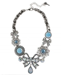Put a bow on it! Betsey Johnson's darling frontal necklace showcases a crystal-accented bow charms with teardrop charm, round glass opal charms and crystal accents. Setting and chain crafted in silver tone mixed metal. Approximate length: 16 inches + 3-inch extender. Approximate drop: 2-1/4 inches. Put a bow on it! Betsey Johnson's darling frontal necklace showcases a crystal-accented bow charms with teardrop charm, round glass opal charms and crystal accents. Setting and chain crafted in silver tone mixed metal. Approximate length: 16 inches + 3-inch extender. Approximate drop: 2-1/4 inches.