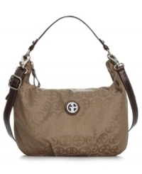 This laid-back silhouette from Giani Bernini gets a little uptown attitude in signature jacquard with a soft sheen finish. Shiny silver-tone hardware and ornamental logo plaque adds extra allure, while slim crossbody strap offers instant versatility. This laid-back silhouette from Giani Bernini gets a little uptown attitude in signature jacquard with a soft sheen finish. Shiny silver-tone hardware and ornamental logo plaque adds extra allure, while slim crossbody strap offers instant versatility.
