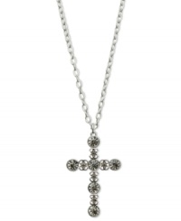 Keep the faith. This pendant necklace from GUESS showcases a cross design embellished with logos and crystal accents. Crafted in silver tone mixed metal. Approximate length: 32 inches + 2-inch extender. Approximate drop: 2-1/2 inches. Keep the faith. This pendant necklace from GUESS showcases a cross design embellished with logos and crystal accents. Crafted in silver tone mixed metal. Approximate length: 32 inches + 2-inch extender. Approximate drop: 2-1/2 inches.
