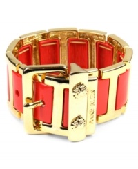 Cuff and ready. This AK Anne Klein bracelet features a belt-inspired stretch design highlighting orange mixed metal set in gold tone mixed metal. Buckle closure. Approximate diameter: 2-1/4 inches. Cuff and ready. This AK Anne Klein bracelet features a belt-inspired stretch design highlighting orange mixed metal set in gold tone mixed metal. Buckle closure. Approximate diameter: 2-1/4 inches.
