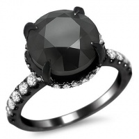 5.25ct Black Diamond Carries Sex & The City 2 Engagement Ring 18k Black Gold with a 4.35ct Center Diamond and .90ct of Surrounding Diamonds 5.25ct Black Diamond Carries Sex & The City 2 Engagement Ring 18k Black Gold with a 4.35ct Center Diamond and .90ct of Surrounding Diamonds