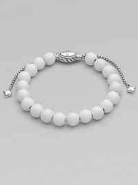 From the Spiritual Bead Collection. Bright white agate beads are accented by polished sterling silver.White agate Sterling silver Width, about 8mm Diameter, about 2 Adjustable clasp Imported