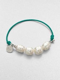 Lustrous pearls on a bright elastic cord with a logo accented charm. 10mm organic white baroque man-made pearlSterling silverElastic cordDiameter, about 2Slip-on styleImported Lustrous pearls on a bright elastic cord with a logo accented charm. 10mm organic white baroque man-made pearlSterling silverElastic cordDiameter, about 2Slip-on styleImported