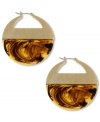 Let your style wander to chic destinations. The eye-catching combination of tortoise and golden hues make these Kenneth Cole New York gypsy hoop earrings a must-own. Crafted in gold tone mixed metal and tortoise resin. Approximate drop: 1-5/8 inches. Approximate diameter: 1-1/2 inches.