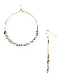 Work this season's exotic influences into your accessories collection with this pair of beaded hoop earrings from Vanessa Mooney, accented by an eclectic mix of silver nuggets. Work this season's exotic influences into your accessories collection with this pair of beaded hoop earrings from Vanessa Mooney, accented by an eclectic mix of silver nuggets.