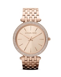 Everything's coming up rose gold! Work this on-trend hue into your wardrobe with accessories--like this Michael Kors watch. You'll love the bracelet strap and the stone detail around the dial. Everything's coming up rose gold! Work this on-trend hue into your wardrobe with accessories--like this Michael Kors watch. You'll love the bracelet strap and the stone detail around the dial.