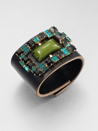 Luxurious leather accented with a glossy resin cabochon surrounded by glittering stones. LeatherResinGlassBrassLength, about 8.7Snap button closureMade in Italy and imported Luxurious leather accented with a glossy resin cabochon surrounded by glittering stones. LeatherResinGlassBrassLength, about 8.7Snap button closureMade in Italy and imported