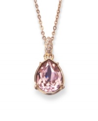 Fit for a princess, this dazzling Lime pendant from Swarovski enchants. In rhodium-plated mixed metal with rose-colored crystal at center surrounded by crystal pave. Approximate length: 15 inches. Approximate drop: 1 inch. Fit for a princess, this dazzling Lime pendant from Swarovski enchants. In rhodium-plated mixed metal with rose-colored crystal at center surrounded by crystal pave. Approximate length: 15 inches. Approximate drop: 1 inch.