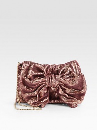 Glamour exudes from this sparkling, sequined covered style accented with a large bow.Concealable chain shoulder strap, 21 dropMagnetic snap flap closureOne inside zip pocketCotton lining11W X 7H X 1DMade in Italy Glamour exudes from this sparkling, sequined covered style accented with a large bow.Concealable chain shoulder strap, 21 dropMagnetic snap flap closureOne inside zip pocketCotton lining11W X 7H X 1DMade in Italy