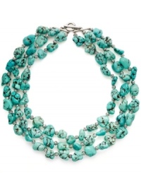 A taste of summer. Three rows of semi-precious turquoise nuggets in varying sizes adorn this pool-blue necklace from Lauren by Ralph Lauren. Toggle closure and accents crafted in silver tone mixed metal. Approximate length: 18, 19 and 20 inches. A taste of summer. Three rows of semi-precious turquoise nuggets in varying sizes adorn this pool-blue necklace from Lauren by Ralph Lauren. Toggle closure and accents crafted in silver tone mixed metal. Approximate length: 18, 19 and 20 inches.