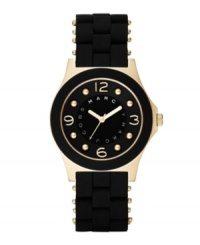Wear it sporty or wear it stylishly: the Pelly watch by Marc by Marc Jacobs. Black silicone-wrapped stainless steel bracelet and round gold ion-plated case. Bezel with black silicone ring. Black dial features applied goldtone numerals at twelve, three, six and nine o'clock, dot markers, three goldtone hands and logo ring at inner dial. Quartz movement. Water resistant to 30 meters. Two-year limited warranty. Wear it sporty or wear it stylishly: the Pelly watch by Marc by Marc Jacobs. Black silicone-wrapped stainless steel bracelet and round gold ion-plated case. Bezel with black silicone ring. Black dial features applied goldtone numerals at twelve, three, six and nine o'clock, dot markers, three goldtone hands and logo ring at inner dial. Quartz movement. Water resistant to 30 meters. Two-year limited warranty.