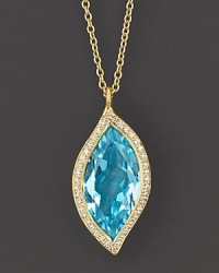 Pavé diamonds circle a sky blue topaz leaf, set in 18K yellow gold.