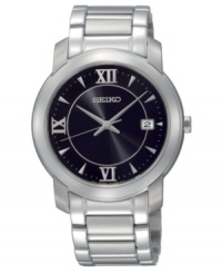 Broad links, stainless steel and simple black bring refinement to this Seiko timepiece. Watch features stainless steel bracelet and round case. Black dial with logo, silvertone hands, triangular indices, Roman numerals at twelve, six and nine o'clock and date window. Analog quartz movement. Water resistant to 30 meters. Three-year limited warranty. Broad links, stainless steel and simple black bring refinement to this Seiko timepiece. Watch features stainless steel bracelet and round case. Black dial with logo, silvertone hands, triangular indices, Roman numerals at twelve, six and nine o'clock and date window. Analog quartz movement. Water resistant to 30 meters. Three-year limited warranty.