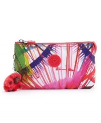 An easy-going wristlet, perfect for the gal on the go. Stash all your goodies in this easy-going design. An adorable monkey keychain completes this fun-loving look. An easy-going wristlet, perfect for the gal on the go. Stash all your goodies in this easy-going design. An adorable monkey keychain completes this fun-loving look.