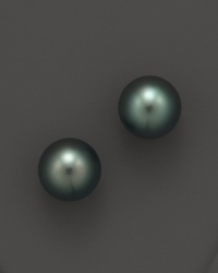 Naturally colored, cultured Tahitian black pearls make a statement on delicate stud earrings. From Tara Pearls. Naturally colored, cultured Tahitian black pearls make a statement on delicate stud earrings. From Tara Pearls.