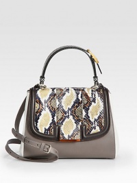 Rich python combines with soft Italian leather in a sophisticated lady-like design. Adjustable top handle, 5¼-5½ dropAdjustable detachable shoulder strap, 19-25½ dropTurn-lock on front flapProtective metal feetOne inside zip pocketLinen lining10½W X 8¼H X 5½DMade in Italy Rich python combines with soft Italian leather in a sophisticated lady-like design. Adjustable top handle, 5¼-5½ dropAdjustable detachable shoulder strap, 19-25½ dropTurn-lock on front flapProtective metal feetOne inside zip pocketLinen lining10½W X 8¼H X 5½DMade in Italy