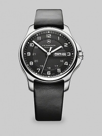 A polished timepiece for the modern gentleman, set in a brushed silver-tone, stainless steel bezel and case with a integrated leather strap for a handsome finish.Quartz movementRound bezelWater resistant to 100ATMDate display at 3 o'clockSecond handStainless steel case: 40mm (1.57)Leather braceletImported A polished timepiece for the modern gentleman, set in a brushed silver-tone, stainless steel bezel and case with a integrated leather strap for a handsome finish.Quartz movementRound bezelWater resistant to 100ATMDate display at 3 o'clockSecond handStainless steel case: 40mm (1.57)Leather braceletImported