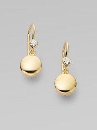 Elegant circles of 18k yellow gold are topped off with luminous diamonds.Diamond, 0.10 tcw 18k yellow gold Drop length, about 1 Ear wire Imported Elegant circles of 18k yellow gold are topped off with luminous diamonds.Diamond, 0.10 tcw 18k yellow gold Drop length, about 1 Ear wire Imported