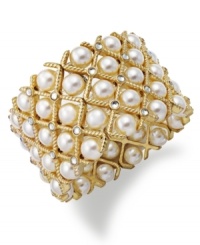 The romantic touch of acrylic pearls adds a lovely accent to this cuff bracelet from Charter Club. Finished with glass stone accents. Crafted in gold tone mixed metal. Approximate width: 2-1/2 inches. Stretches to fit wrist. The romantic touch of acrylic pearls adds a lovely accent to this cuff bracelet from Charter Club. Finished with glass stone accents. Crafted in gold tone mixed metal. Approximate width: 2-1/2 inches. Stretches to fit wrist.