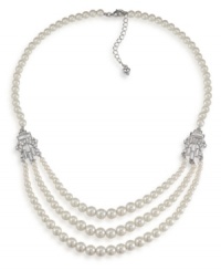 The classic elegance of pearls. Carolee's sophisticated three-row necklace features glass pearls accented by sparkling silver tone spacers with crystal accents. Set in imitation rhodium-plated mixed metal. Approximate length 20 inches + 2-inch extender. The classic elegance of pearls. Carolee's sophisticated three-row necklace features glass pearls accented by sparkling silver tone spacers with crystal accents. Set in imitation rhodium-plated mixed metal. Approximate length 20 inches + 2-inch extender.
