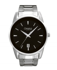 A sophisticated statement for a modern man. Watch by Caravelle by Bulova crafted of silver tone mixed metal bracelet and large, round case. Glossy black enamel dial features silver tone stick indices, date window at six o'clock, three hands and logo. Quartz movement. Water resistant to 30 meters. Two-year limited warranty. A sophisticated statement for a modern man. Watch by Caravelle by Bulova crafted of silver tone mixed metal bracelet and large, round case. Glossy black enamel dial features silver tone stick indices, date window at six o'clock, three hands and logo. Quartz movement. Water resistant to 30 meters. Two-year limited warranty.