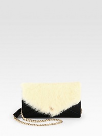 Thanks to natural rabbit fur and a stylish chain-and-leather shoulder strap, this leather wallet is a must-carry this season. Detachable chain-and-leather shoulder strap, 22½ dropSnap closureTwo outside open pocketsOne inside zip pocketTwo inside open pocketsTwelve credit card slotsOne bill compartmentCotton lining8W X 5H X 1DImported Thanks to natural rabbit fur and a stylish chain-and-leather shoulder strap, this leather wallet is a must-carry this season. Detachable chain-and-leather shoulder strap, 22½ dropSnap closureTwo outside open pocketsOne inside zip pocketTwo inside open pocketsTwelve credit card slotsOne bill compartmentCotton lining8W X 5H X 1DImported