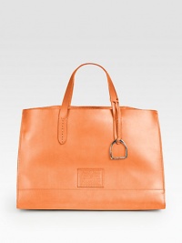 A style inspired by classic Americana in smooth leather.Double top handles, 5½ dropTab closureOne detachable zip pouch16W X 11H X 8½DImported A style inspired by classic Americana in smooth leather.Double top handles, 5½ dropTab closureOne detachable zip pouch16W X 11H X 8½DImported