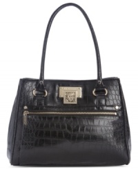 Gorgeous gator pattern is paired with delicate silver-tone hardware in this go-anywhere satchel from AK Anne Klein. A well-organized interior provides discrete pockets for sunglasses, cell phone and PDA. Gorgeous gator pattern is paired with delicate silver-tone hardware in this go-anywhere satchel from AK Anne Klein. A well-organized interior provides discrete pockets for sunglasses, cell phone and PDA.
