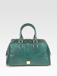 A rich, crocodile embossed leather design that possesses the character of German functionality and craftsmanship.Double top handles, 4 dropTop zip closureProtective metal feetOne inside zip pocketFully lined13W X 8H X 5½DMade in Italy A rich, crocodile embossed leather design that possesses the character of German functionality and craftsmanship.Double top handles, 4 dropTop zip closureProtective metal feetOne inside zip pocketFully lined13W X 8H X 5½DMade in Italy
