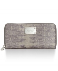 Stay organized in the most exotic way with this leather lovely from MICHAEL Michael Kors. Posh, python-print and signature plaque adorn the outside, while the pocket-lined interior keeps your currency in check. Stay organized in the most exotic way with this leather lovely from MICHAEL Michael Kors. Posh, python-print and signature plaque adorn the outside, while the pocket-lined interior keeps your currency in check.
