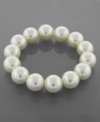 The accent you need to make your look extra-special. This Charter Club stretch bracelet is crafted in simulated plastic pearls (14 mm) set in mixed metal. Approximate diameter: 2 inches.