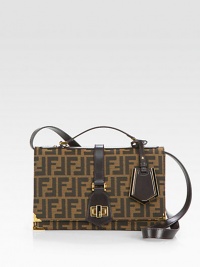 Iconic signature jacquard accented with luxuriously smooth leather trim.Leather top handle, 2 dropAdjustable leather shoulder strap, 19-22½ dropTurnlock flap closureTwo inner compartmentsOne inside zip pocketCotton lining10½W X 6½H X 5¼DMade in Italy Iconic signature jacquard accented with luxuriously smooth leather trim.Leather top handle, 2 dropAdjustable leather shoulder strap, 19-22½ dropTurnlock flap closureTwo inner compartmentsOne inside zip pocketCotton lining10½W X 6½H X 5¼DMade in Italy