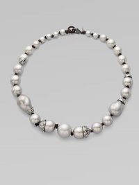 Delicate gunmetal chains hold one lustrous, white baroque shell pearl, with a Swarovski crystal-set bale and cap.Shell pearlCrystalRuthenium platedLength, about 16 with 3 extenderLobster claspMade in USA Delicate gunmetal chains hold one lustrous, white baroque shell pearl, with a Swarovski crystal-set bale and cap.Shell pearlCrystalRuthenium platedLength, about 16 with 3 extenderLobster claspMade in USA