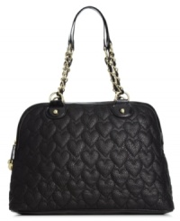 Let your look shine day and night with this shimmery metallic satchel from Betsey Johnson. Poised, pocked-lined and adorned with a sweet heart-embossed pattern, it's a true trend-setter. Let your look shine day and night with this shimmery metallic satchel from Betsey Johnson. Poised, pocked-lined and adorned with a sweet heart-embossed pattern, it's a true trend-setter.