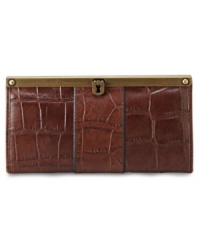 Add some exotic appeal to your accessories arsenal with this croc-embossed leather clutch from Fossil. Accented with vintage-inspired hardware and detail stitching, it boasts a pocket-lined interior to keep you organized anywhere. Add some exotic appeal to your accessories arsenal with this croc-embossed leather clutch from Fossil. Accented with vintage-inspired hardware and detail stitching, it boasts a pocket-lined interior to keep you organized anywhere.