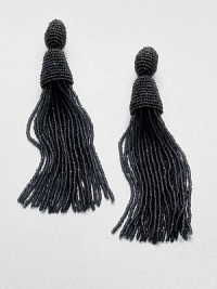 An elegant style with long strands of shiny beads. Glass beadsLength, about 5Clip-on backImported An elegant style with long strands of shiny beads. Glass beadsLength, about 5Clip-on backImported