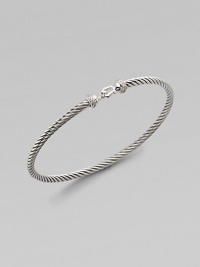 From the Cable Collectibles Collection. A sterling silver twisted cable band with diamond pavé detailing along a signature buckle.Diamond, .07 tcw Sterling silver Width, about 3mm Hook closure Imported From the Cable Collectibles Collection. A sterling silver twisted cable band with diamond pavé detailing along a signature buckle.Diamond, .07 tcw Sterling silver Width, about 3mm Hook closure Imported